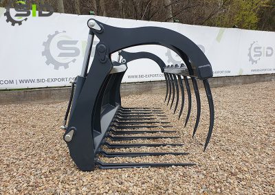 Manure fork with grapple