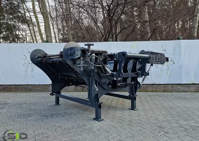 A SID spreader in operation on a farm