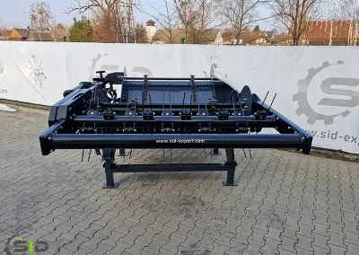 A SID spreader in operation on a farm