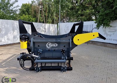A SID spreader in operation on a farm