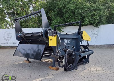 A SID spreader in operation on a farm