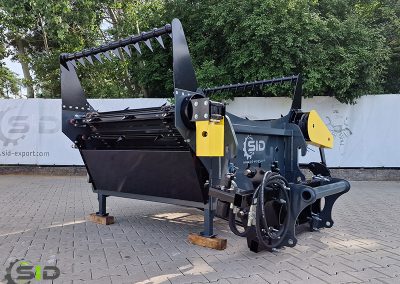 A SID spreader in operation on a farm