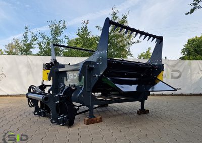 A SID spreader in operation on a farm
